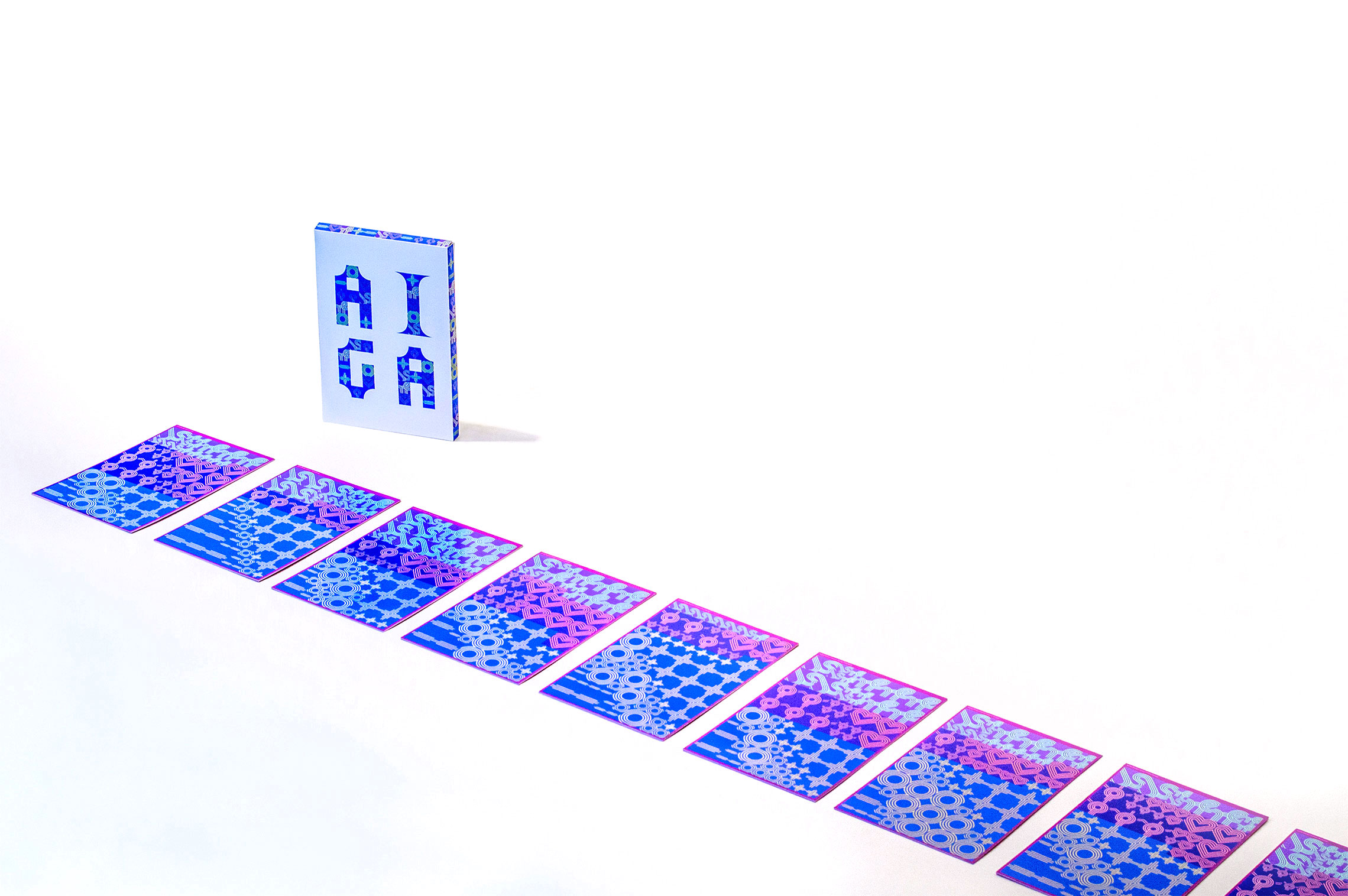 card box next to a row of laid out cards